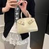 Liten väska dam sommar mångsidig ny mode enkel axelremsväska bärbar liten fyrkantig väska