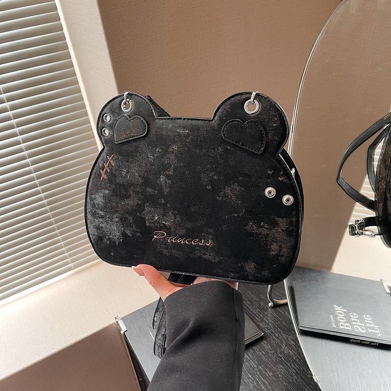 

Niche design casual backpack women s new versatile cartoon shoulder messenger bag fashionable small backpack чёрный