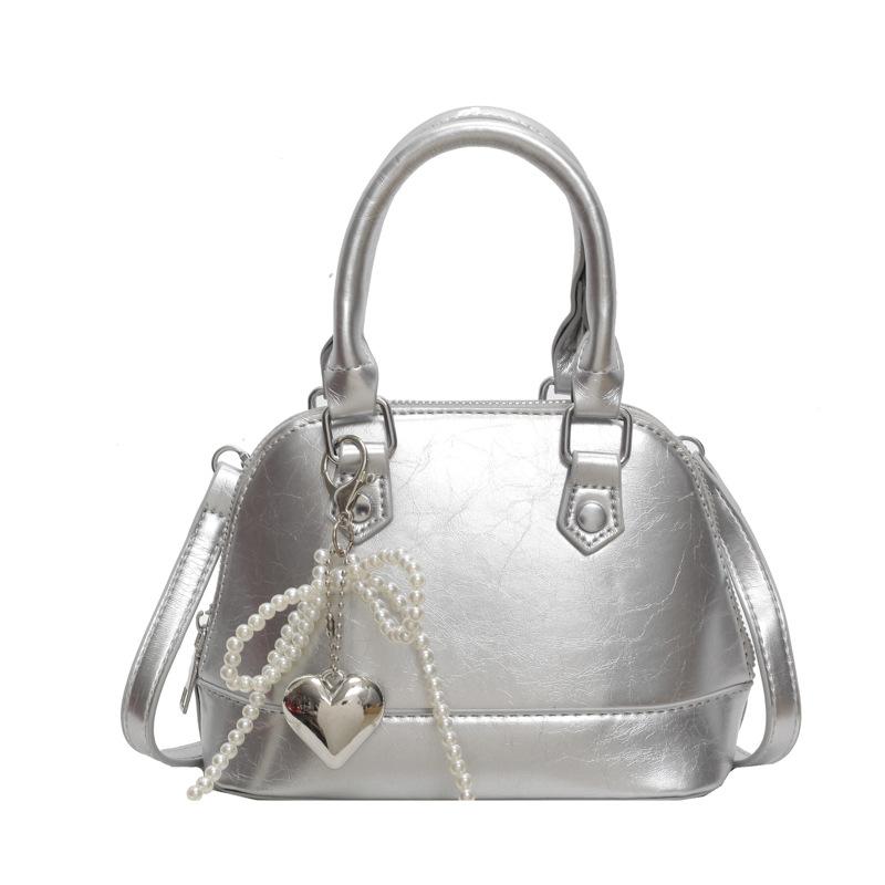 

This year s popular small bag women s 2024 new fashion high sense shell shoulder messenger bag Internet celebrity explosion portable срібний