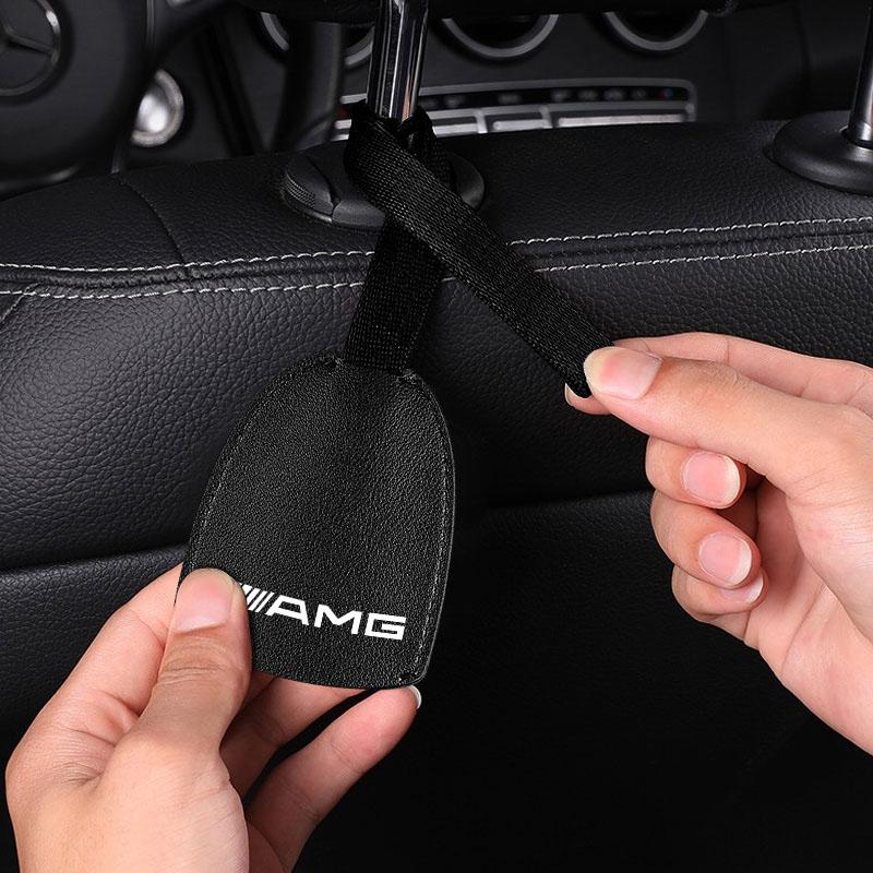1/2pcs Leather Car Seat Back Hooks Portable Hanging Bag Rack For Mercedes Benz AMG W212 W205 W246 W177 W176 W213 GLC GLE GLS ML Welcome Laser Lamp