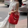 Niche high-value double-sided striped canvas bag 2025 new large-capacity casual versatile commuter shoulder tote bag