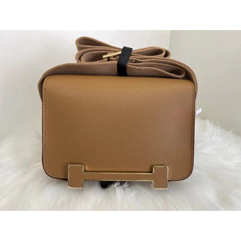 2025 New Leather Women's Bag Goat Pattern Leather Men's and Women's Same Clogs Wide Shoulder Strap Epoxy Leather Color Buckle Cross-border Wholesale