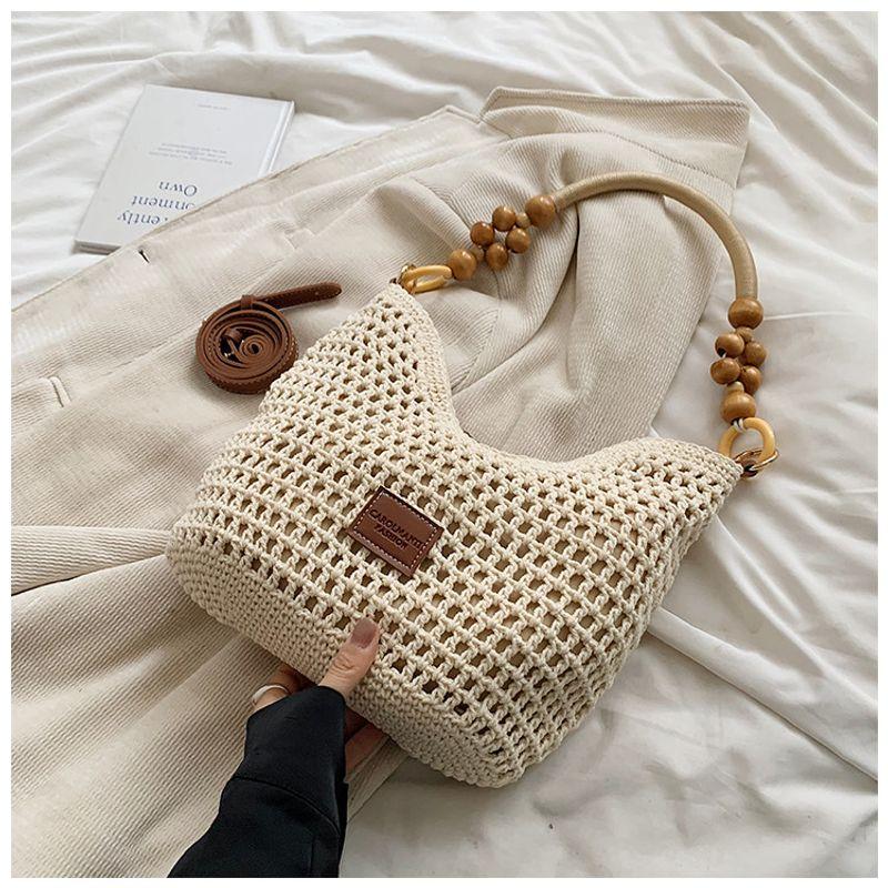 

Summer Western Style Weaving Hollow Tote Bag Female 2025 New Arrival Casual Portable Straw-Weaved Bag Large-Capacity Crossbody Bag Brown small size