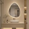 Espejo de baño asimétrico con iluminación LED ambiental, función antivaho y control táctil