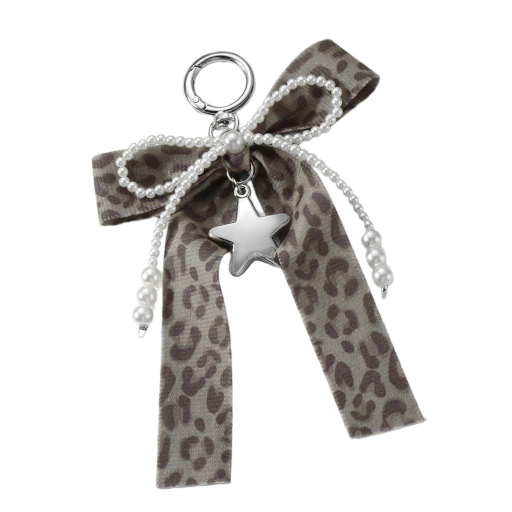 Breloczek z kokardkami dla kobiet dziewcząt z nadrukiem w panterkę akcesoria do torebek zawieszka dla kobiet stopowy brelok modne zawieszki do torebek