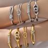 18K Gold-Plated Stainless Steel Bracelet with Diamond Zircon Buckle and Heart Knot Double Ring Design