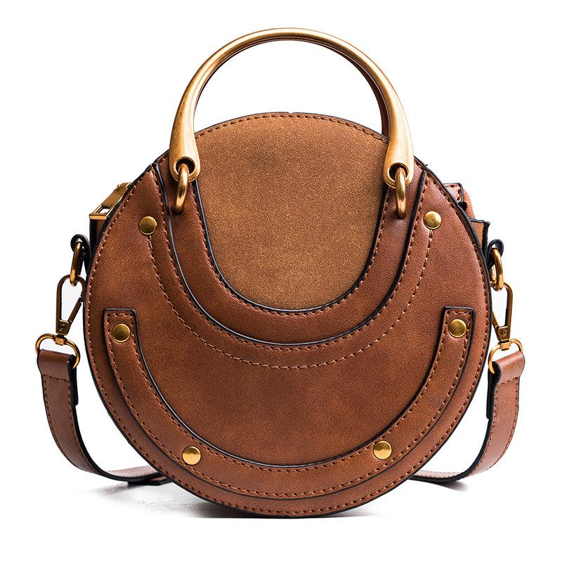 

Women s explosive bag Women s small round bag European and American fashion matte splicing single shoulder crossbody handbag Brand design bag коричневий