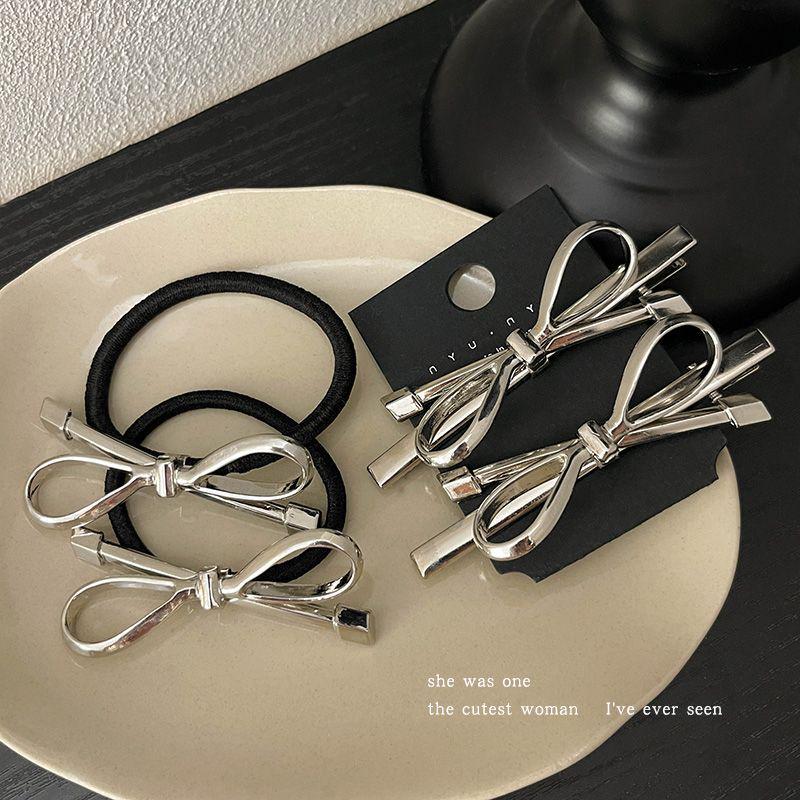 

Exquisite Silver Bow Side Bangs Hair Clip for Women - Duckbill Design with Ponytail Ring