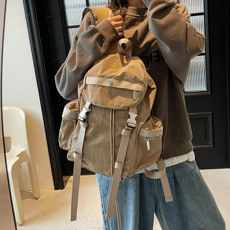 Niche design backpack female college students large-capacity travel backpack Japanese simple commuter high school students schoolbag tide