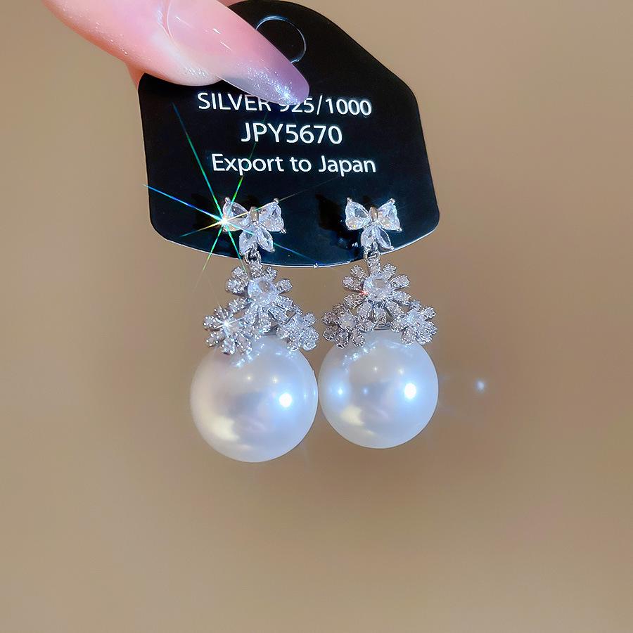 Silver Needle Water Drop Tassel Earrings - Light Luxury High-End Design for Women's Fashion.