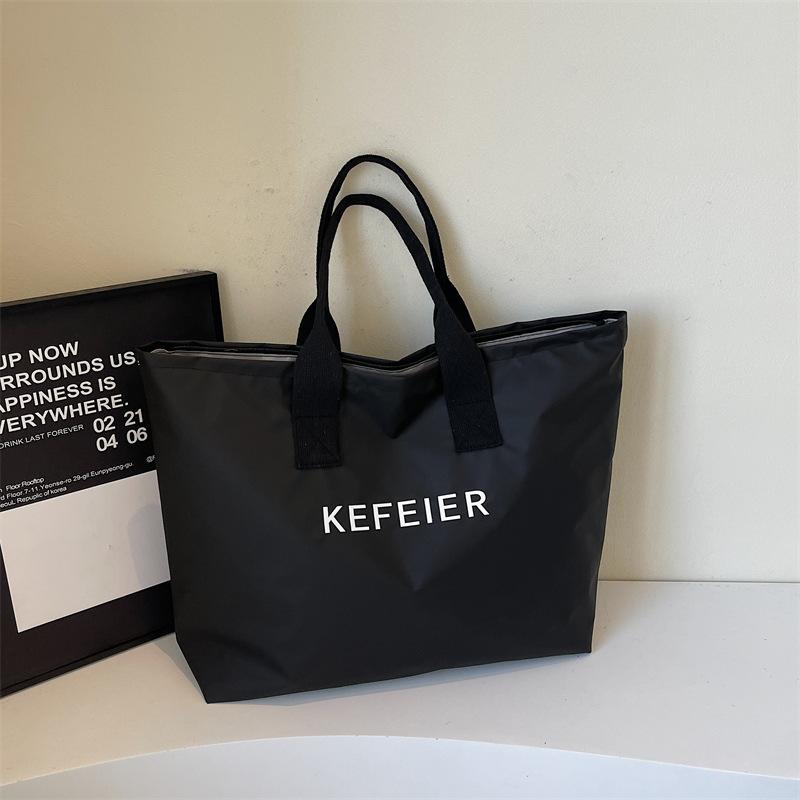 

New Oxford cloth shoulder bag trendy casual fashion large capacity tote bag simple letter underarm commuter bag чёрный