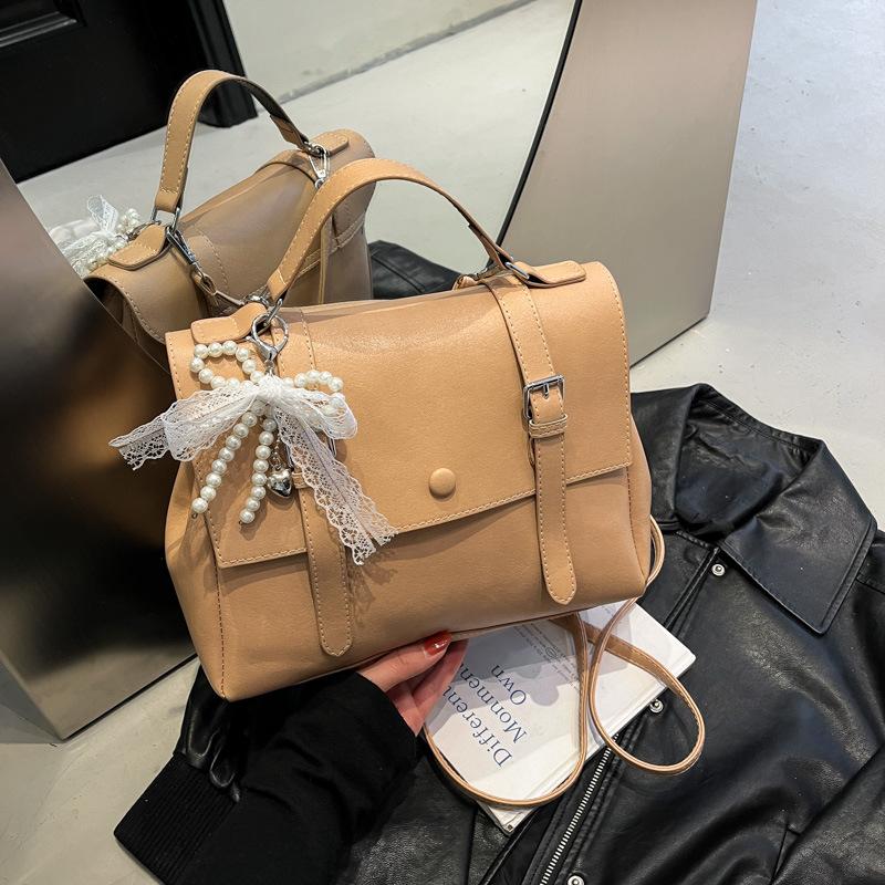 Retro preppy style large-capacity handbag women's 2025 summer new Korean version solid color backpack textured messenger bag