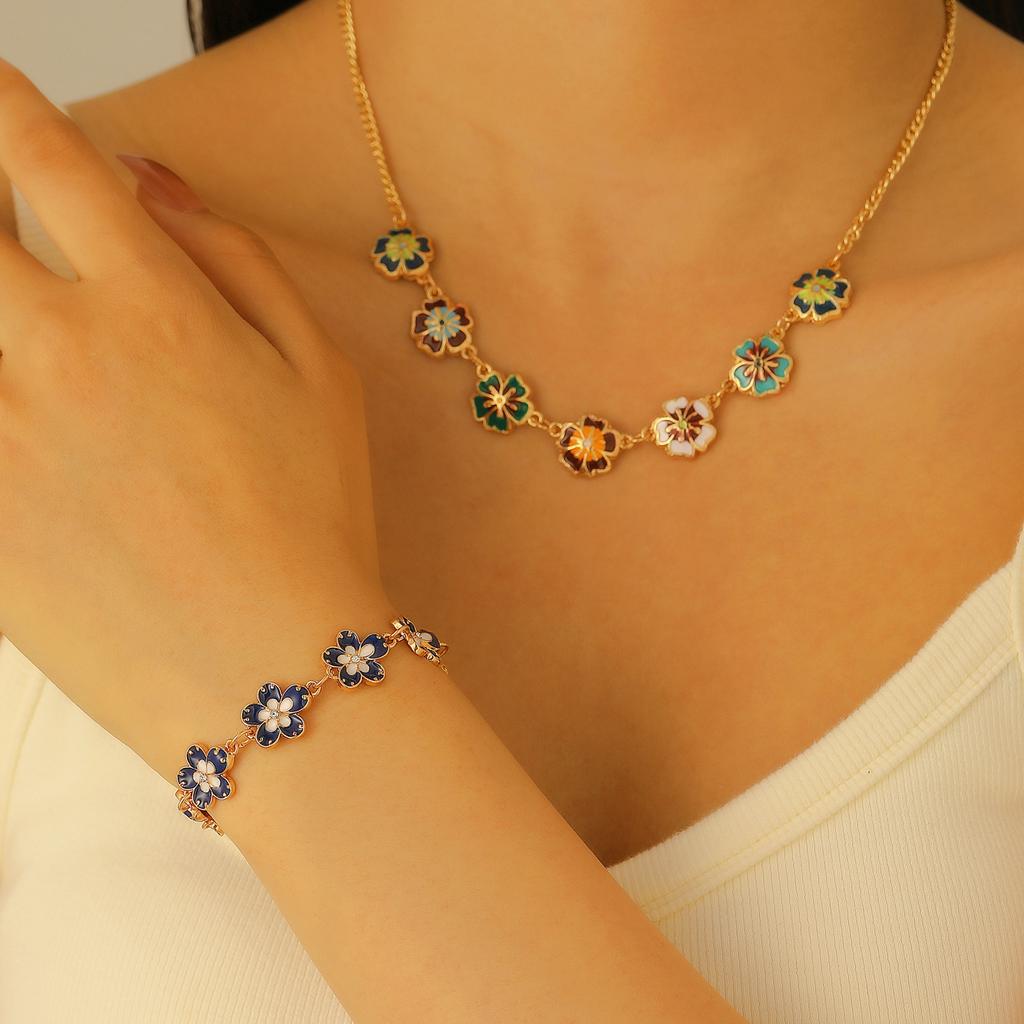 Retro oil dripping flower women's bracelet women's light luxury versatile high-end sense niche design sense color flower pendant jewelry