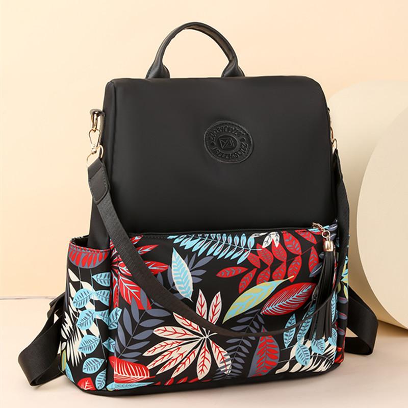 Women's Anti-Theft Large Capacity Backpack  Simple Style  Leisure and Travel  Waterproof Fabric  Female Shoulder Bag  New