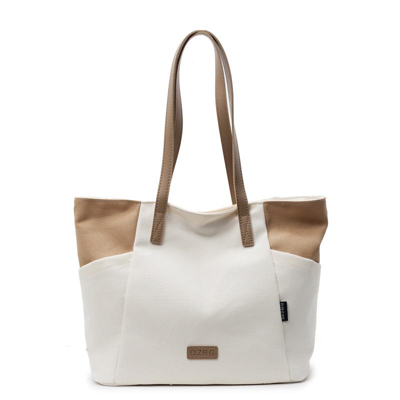 2025 neue Umhänge-Messenger-Canvas-Tragetasche mit großem Fassungsvermögen, tragbarer Modetrend, vielseitig, lässig, farblich passend, Damentasche