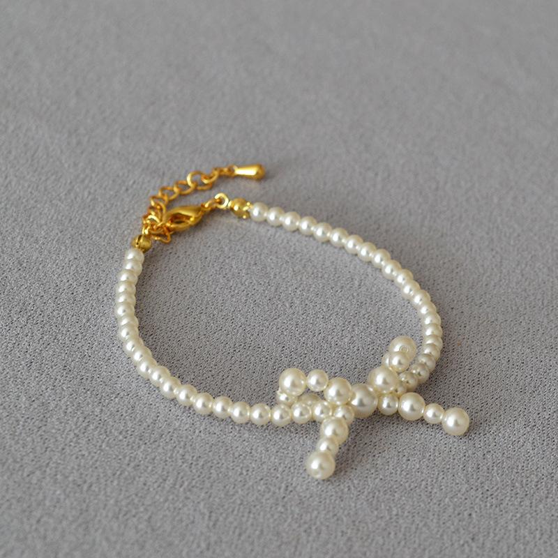 French Niche Elegant and Bright Imitation Shijia Pearl Bow Shape Simple Temperament Short Necklace Choker Woman