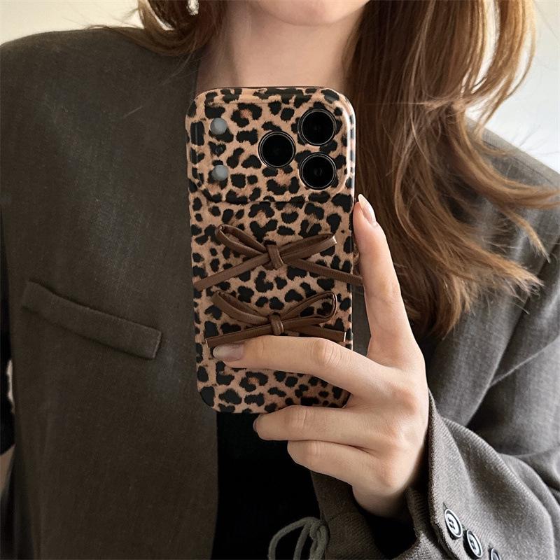 Leopard Print Bow Phone Case, Brown, Compatible with iPhone 17 Pro Max, 15 Pro, 16 Pro, and 14 Pro.