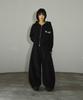 Seulliggeullou Angel Applique Curved Sweatpants [Black]
