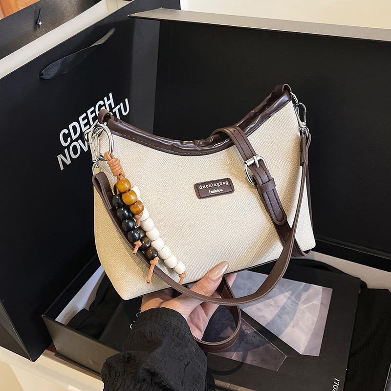 Korean version of fashion bag women's summer 2025 new messenger women's bag niche Korean version of casual and fashionable shoulder armpit bag