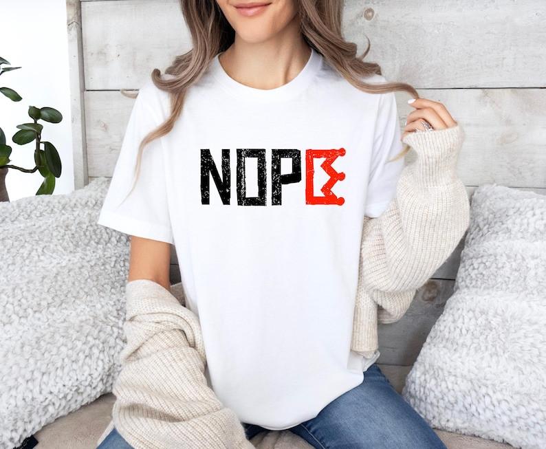 NOPE No Kings Protest Shirt | Bold Crown Graphic Anti-Monarchy Equality Tee Unisex T-Shirt XXXXL