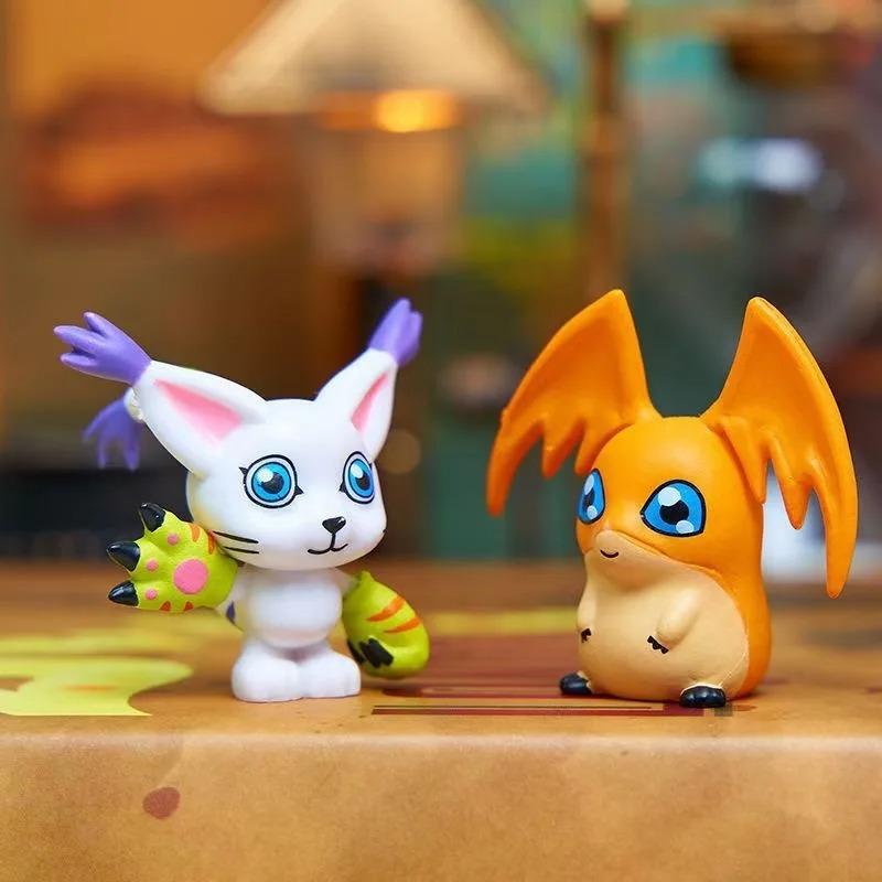 9-piece set of cute Japanese Digimon Adventure anime figures, including Agumon, Patamon, and Gabumon. PVC tabletop figurines.