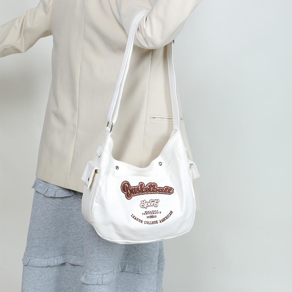 Korean Trendy Canvas Messenger Bag: Large Capacity for Women & Men, Sports Style