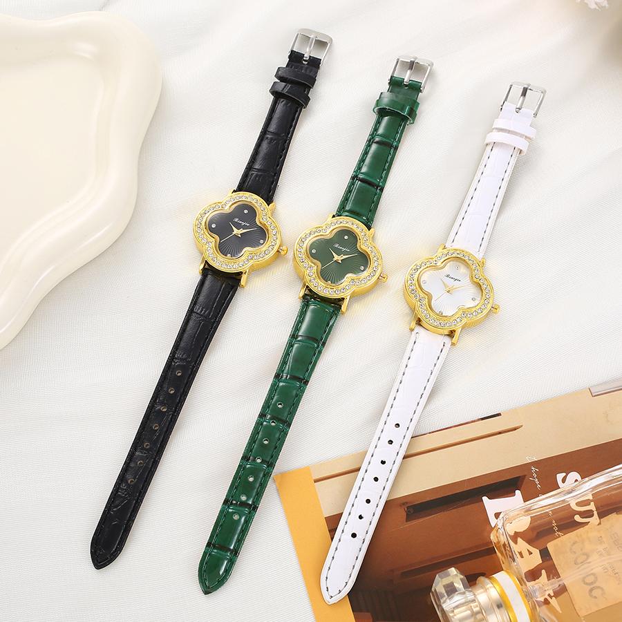 Quartz watch with four-leaf clover diamond dial shell strap luxury for students in summer graduation season.