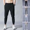 Men Pants Solid Color Drawstring Mid Waist Pockets Loose Streetwear Straight Working Trousers for Daily Wear