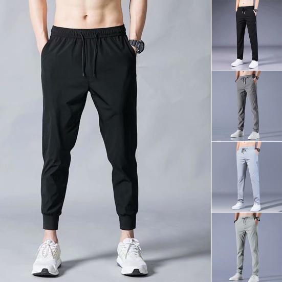 Men Pants Solid Color Drawstring Mid Waist Pockets Loose Streetwear Straight Working Trousers for Daily Wear