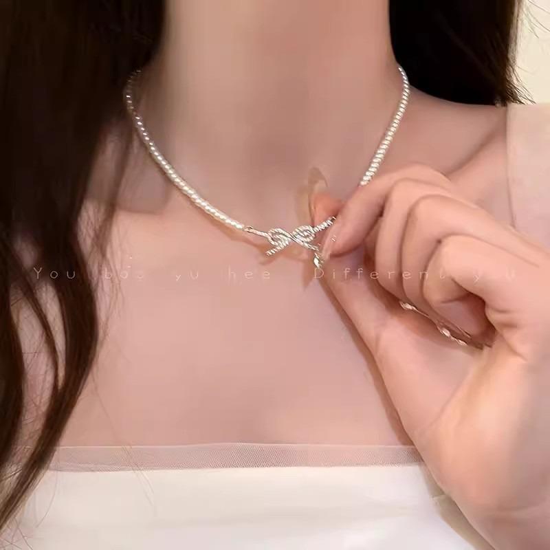 Millet beads pearl bow necklace women's niche high-end clavicle chain new temperament accessories