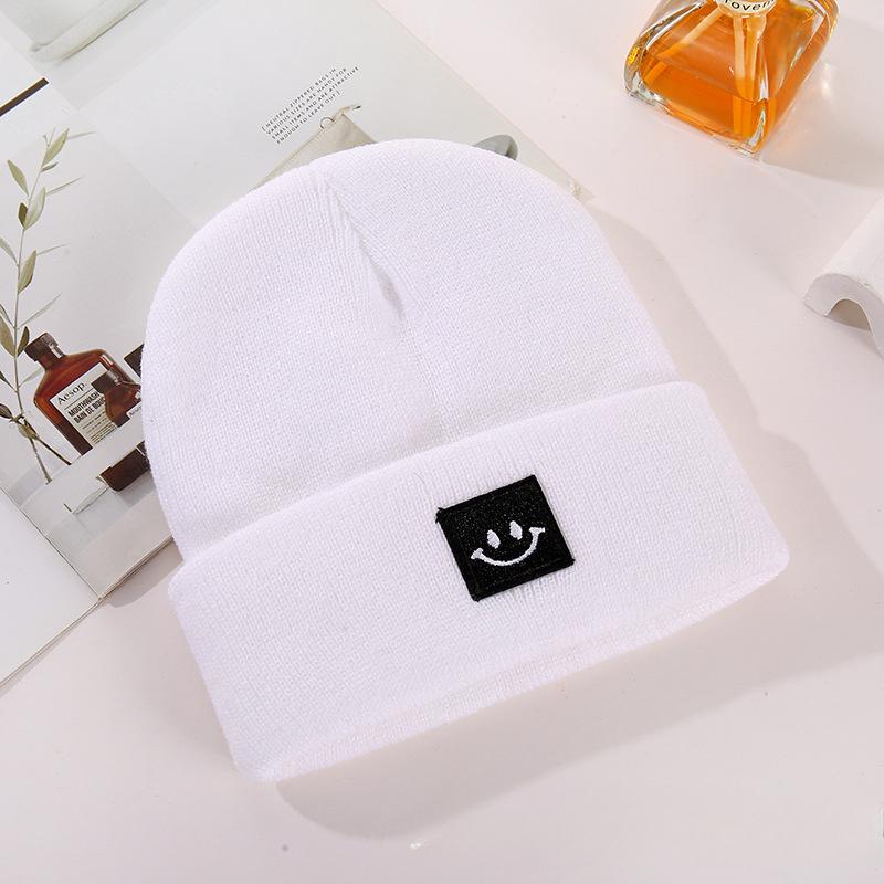 Children's Smiling Face Hats In Stock Children's Candy Colored Knitted Hats with Embroidery Cold Hats for Boys Girls Smiling Face Logo Yarn Hats