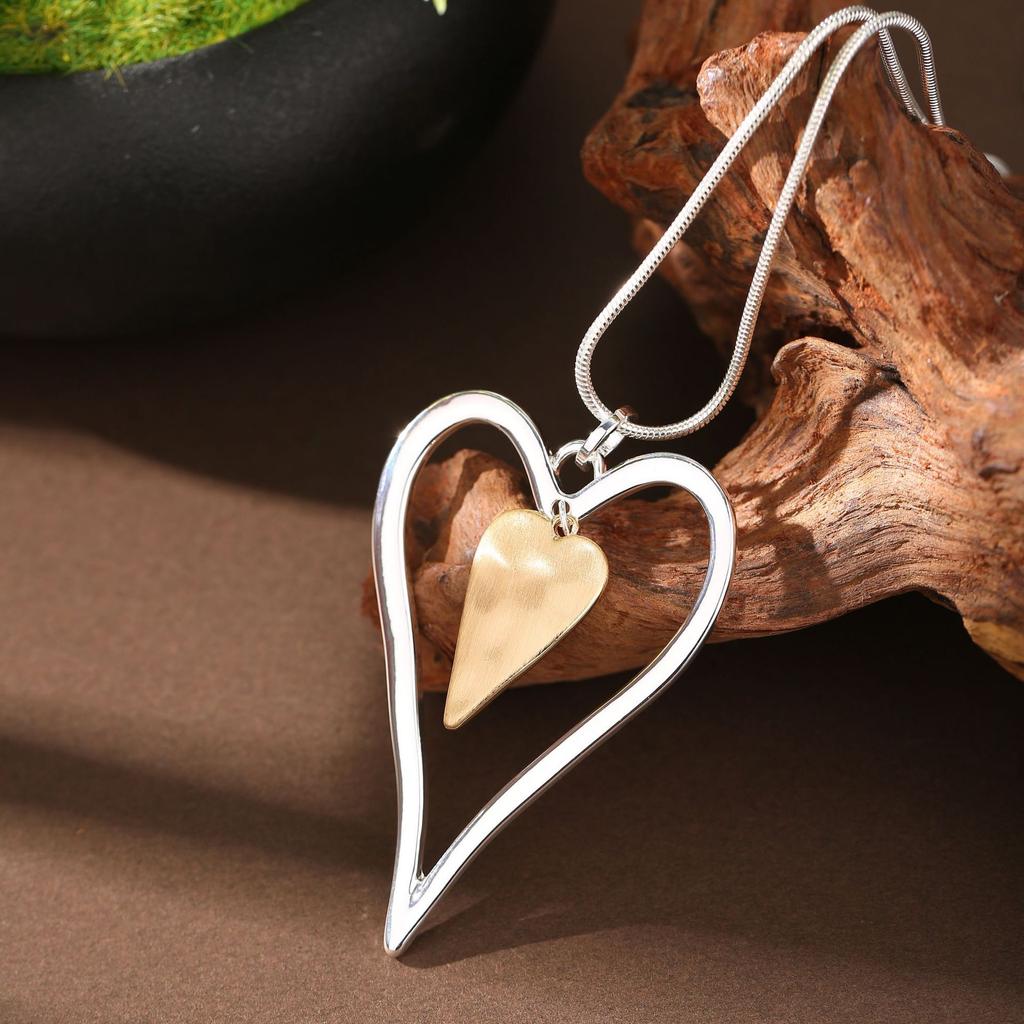 New hollow brushed love long pendant, women's simple and high-end heart-shaped snake chain long necklace