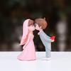 Charming Wedding Cake Topper Featuring Miniature Bride and Groom