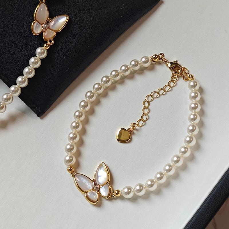 

Комплект ожерелья-чокера с бабочкой из пресноводного жемчуга и барочного браслета для женщин с дизайном застежки OT.