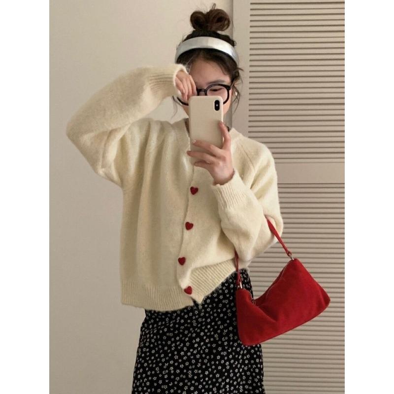 Sweet soft waxy love buckle knitted cardigan women's autumn and winter new loose fashion age-reducing crew neck sweater jacket