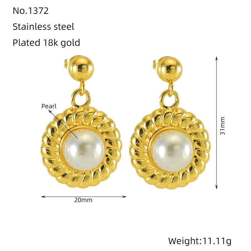 Simple and versatile high-end stainless steel sunflower pearl earrings French titanium steel earrings women
