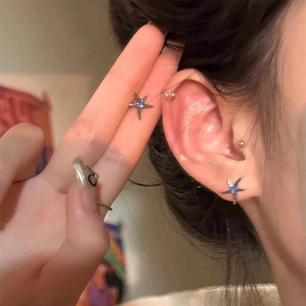 New simple and small blue starfish stud earrings for women's design niche earrings, colored enamel star earrings.