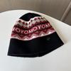 Autumn and winter new Fair Island style retro jacquard knitted hat women's cold and warm ear protection hat bag head wool hat