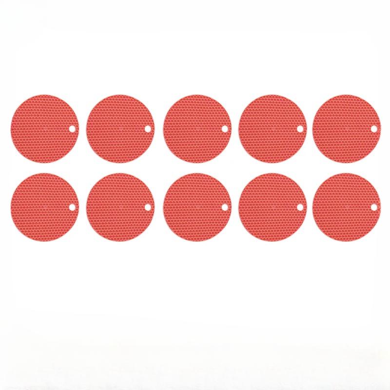 10 stilvolle und praktische Matten in Wabenform. Hitzebeständiger Untersetzer aus Silikon. Schützen Sie Ihre Arbeitsplatten mit diesem stilvollen Tischset.