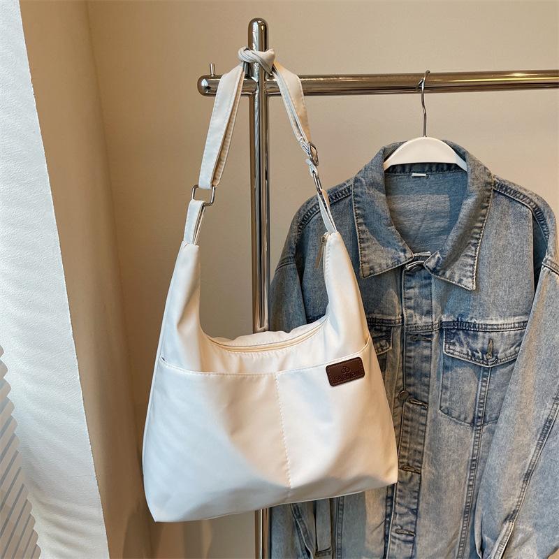 Lightweight canvas bag bag Large capacity women's shoulder messenger bag College student class schoolbag Casual fashion Japanese college