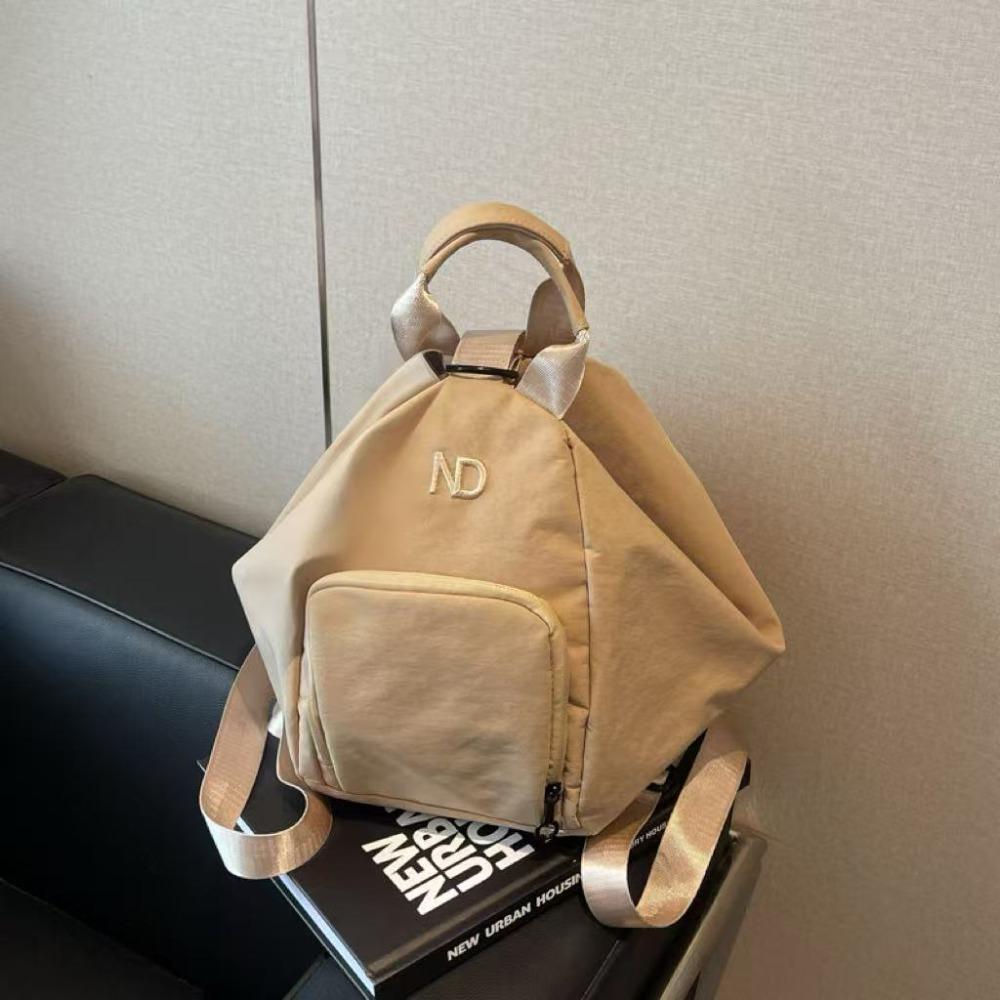 

a trendy new arrival. this casual and adaptable backpack can be worn as a backpack or a multi-functional crossbody bag