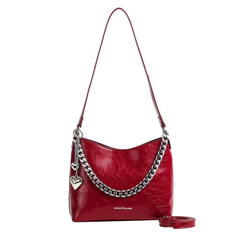 

Новая стильная сумка с нишевым дизайном, которая выглядит как высококачественная сумка на одно плечо и через плечо, известная в Интернете и популярная