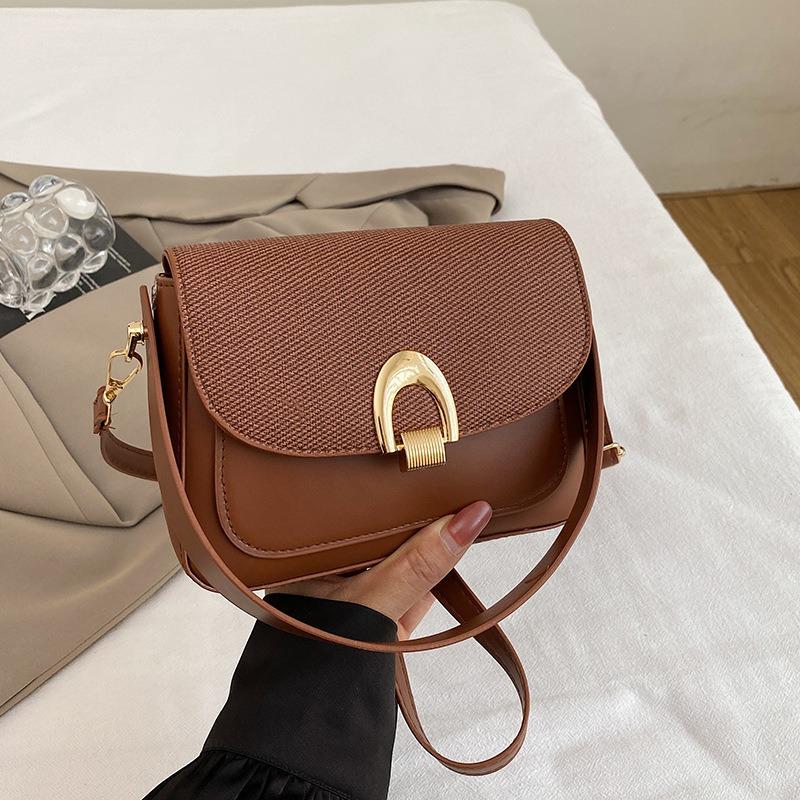 Retro niche underarm bag women's new trendy fashion saddle bag simple and versatile shoulder messenger bag