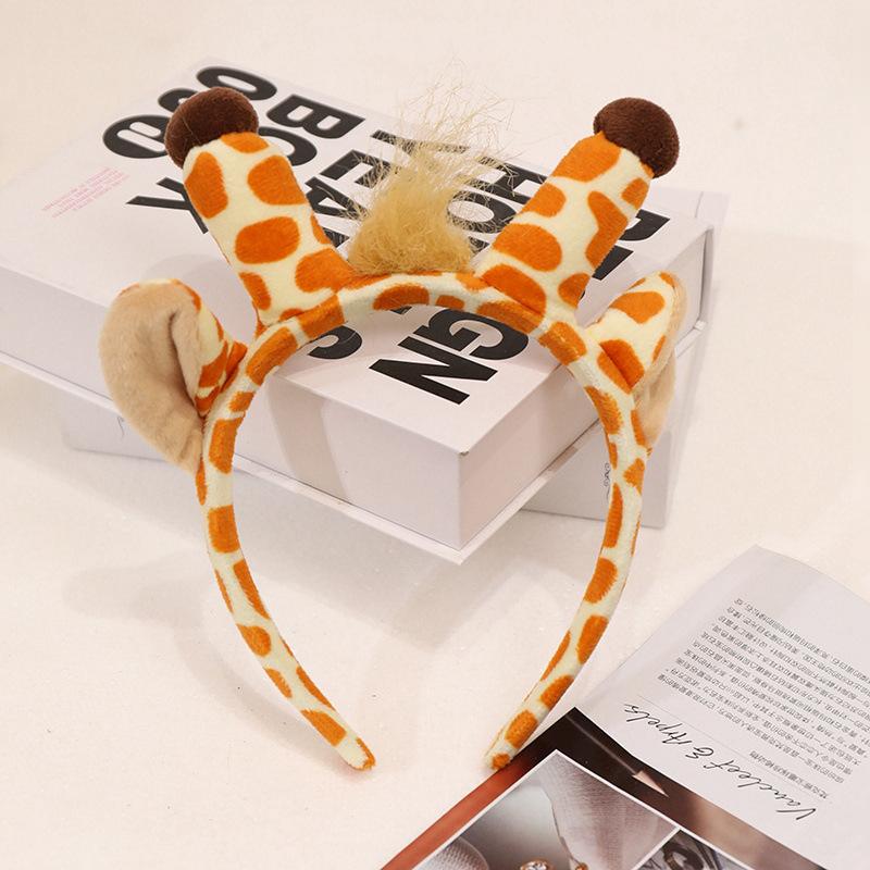 

Cute simulation animal giraffe doll plush toy deer doll children soothing rag doll photography props 20cm headband (0.2kg)