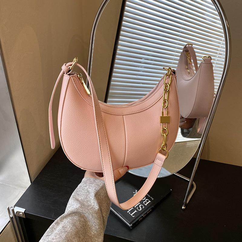 

Популярные сумки женская новая летняя нишевая цепочка сумка под мышкой модная сумка-пельмень на плечо через плечо розовый