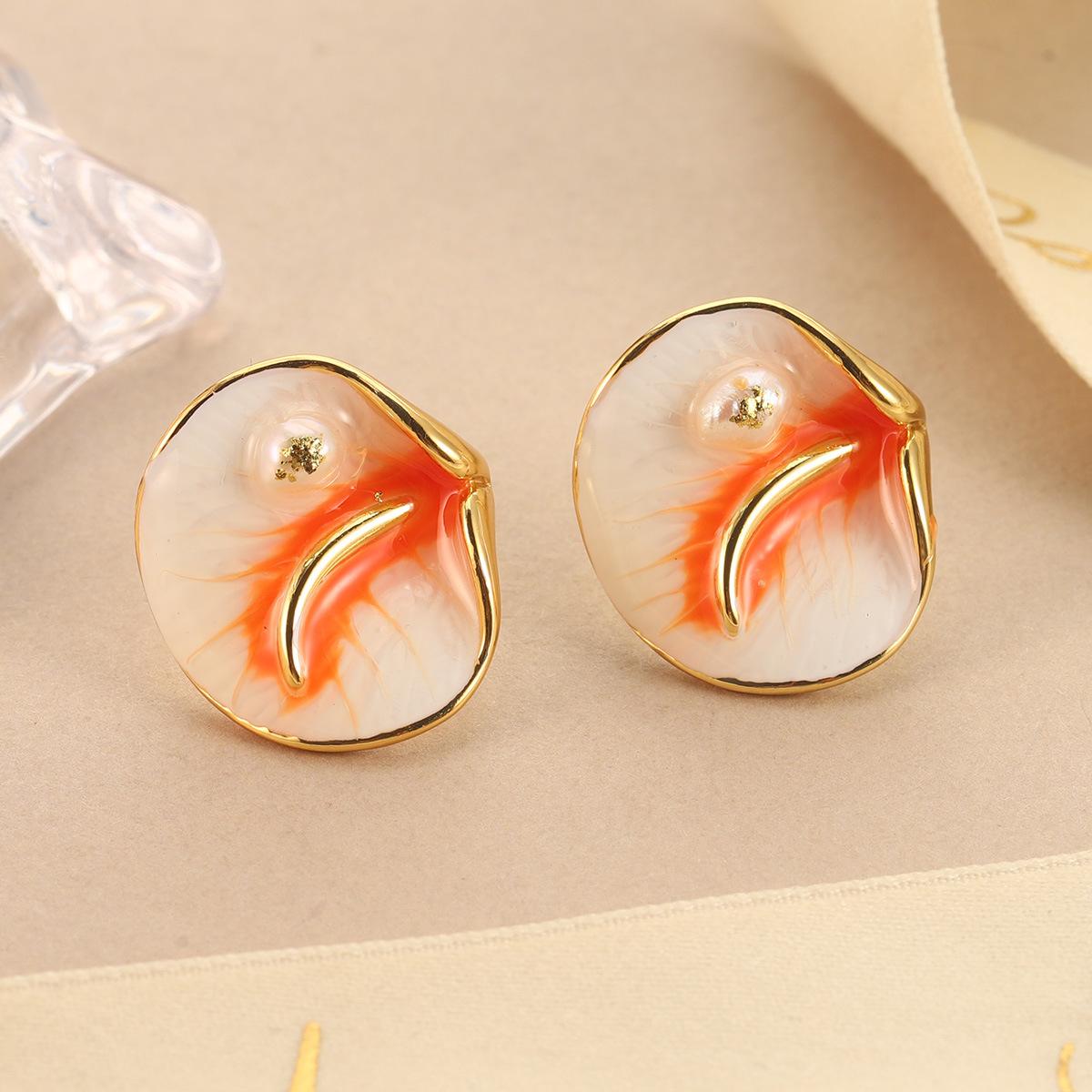 

Natural pearl creative stud earrings leaf temperament high-end earrings autumn and winter design sense fashion personality niche earrings women