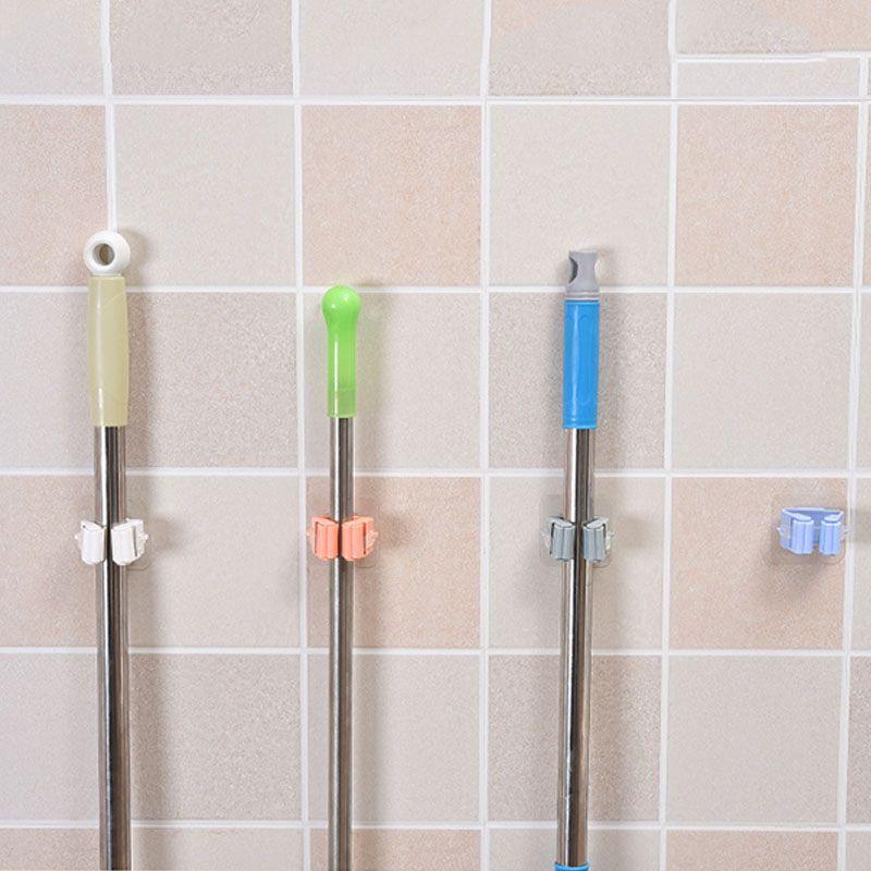 Functional Wall Mounted Mop Organizer Holder Featuring Space-saving Broom Hanger Design