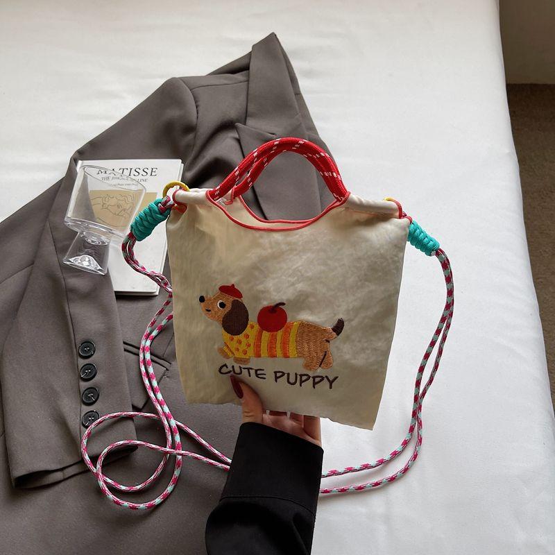 

Japan fashion Cute Embroidered Sausage Dog Bucket Bag Women 2025 New Mobile Phone Bag Versatile Commuter Shoulder Messenger Bag White