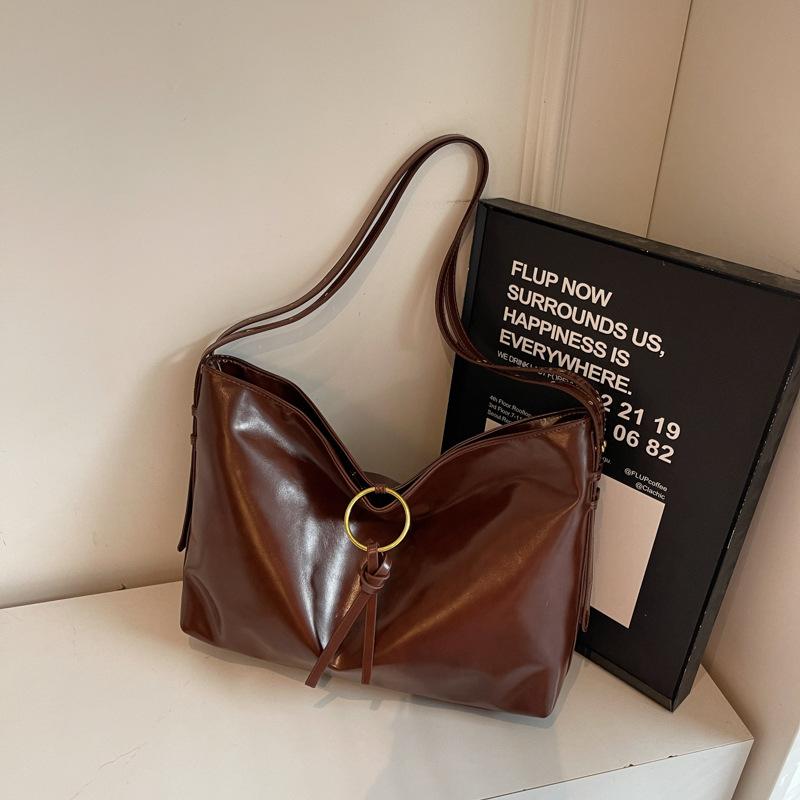 

Bag women s 2025 new retro commuter tote bag fashionable versatile shoulder bag niche design armpit cross-body bag коричневий