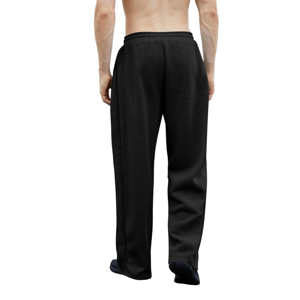 Pánské tepláky s elastickým pasem, rovný a široký střih, volný střih, s kapsami v pase.